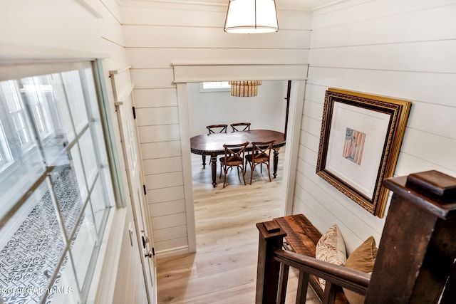917 N Boyer Ave, Sandpoint, ID 83864 - corridor with light wood-style flooring and wooden walls