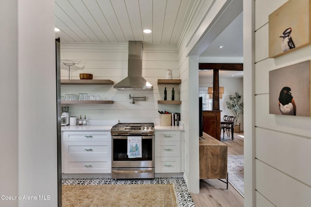 917 N Boyer Ave, Sandpoint, ID 83864 - kitchen featuring stainless steel gas range oven, island exhaust hood, light wood-style floors, open shelves, and wooden ceiling