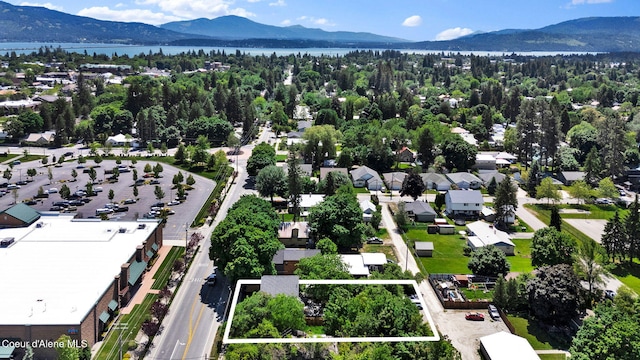 917 N Boyer Ave, Sandpoint, ID 83864 - aerial view of property and surrounding area featuring property boundaries highlighted and a water and mountain view