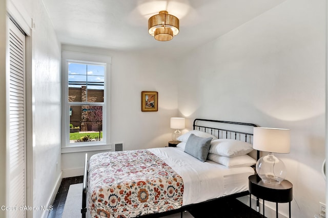 917 N Boyer Ave, Sandpoint, ID 83864 - bedroom with baseboards and wood finished floors