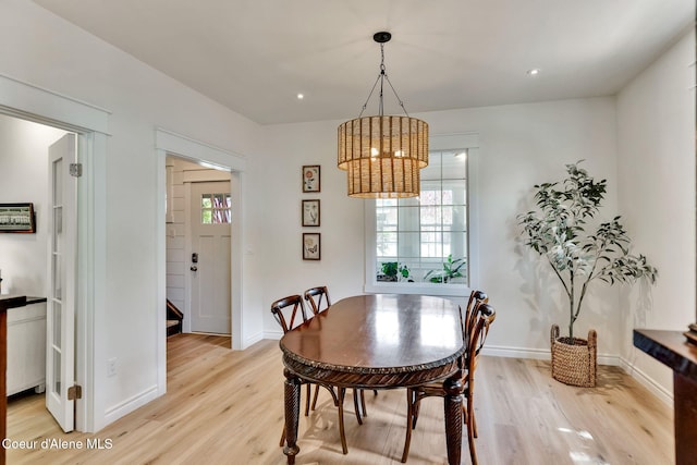 917 N Boyer Ave, Sandpoint, ID 83864 - dining space with light wood-style floors, a chandelier, and recessed lighting