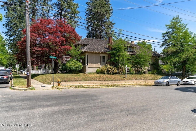 602 N Government Way, Coeur Dalene, ID 83814 - obstructed view of property with a chimney