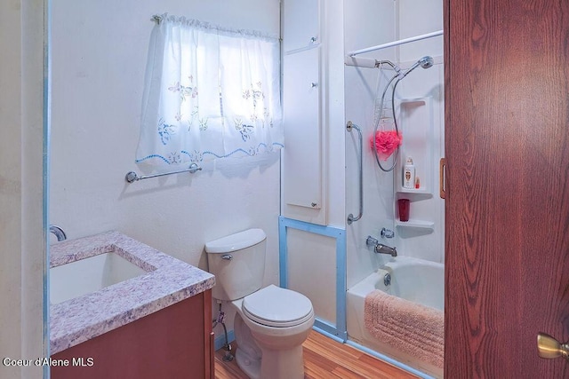 164 W Fork Pine Creek Rd, Pinehurst, ID 83850 - bathroom with vanity, wood finished floors, and shower / bath combination