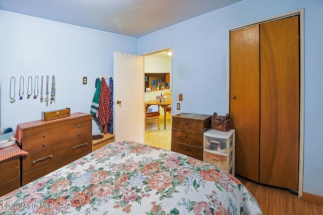 164 W Fork Pine Creek Rd, Pinehurst, ID 83850 - bedroom featuring a closet and wood finished floors