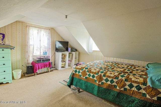 164 W Fork Pine Creek Rd, Pinehurst, ID 83850 - carpeted bedroom featuring a textured ceiling, wallpapered walls, and vaulted ceiling