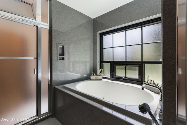 677 Telemark Rd Unit 1, Sandpoint, ID 83864 - bathroom featuring a jetted tub and a stall shower