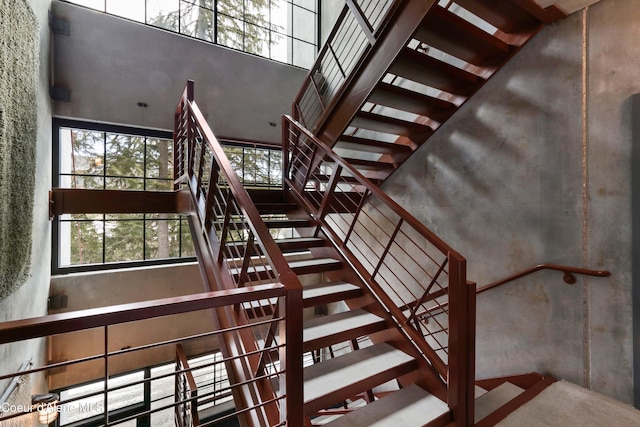 677 Telemark Rd Unit 1, Sandpoint, ID 83864 - staircase featuring a high ceiling