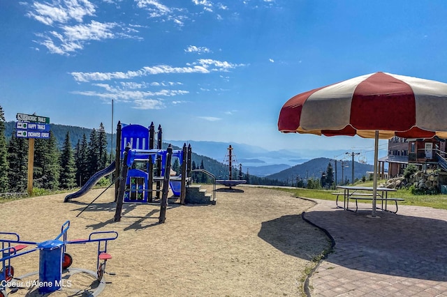 677 Telemark Rd Unit 1, Sandpoint, ID 83864 - community playground featuring a mountain view