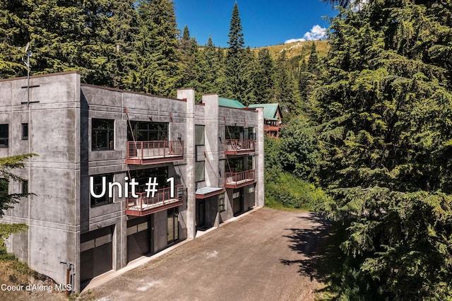 677 Telemark Rd Unit 1, Sandpoint, ID 83864 - view of property featuring a wooded view