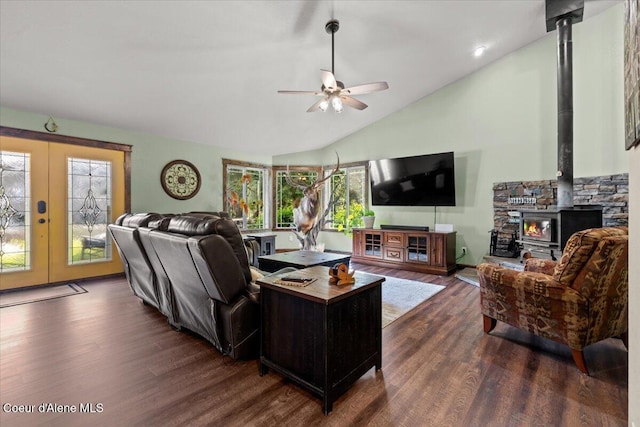 438 Berry Hl, Cocolalla, ID 83813 - living room with a wood stove, a ceiling fan, dark wood-style floors, lofted ceiling, and french doors