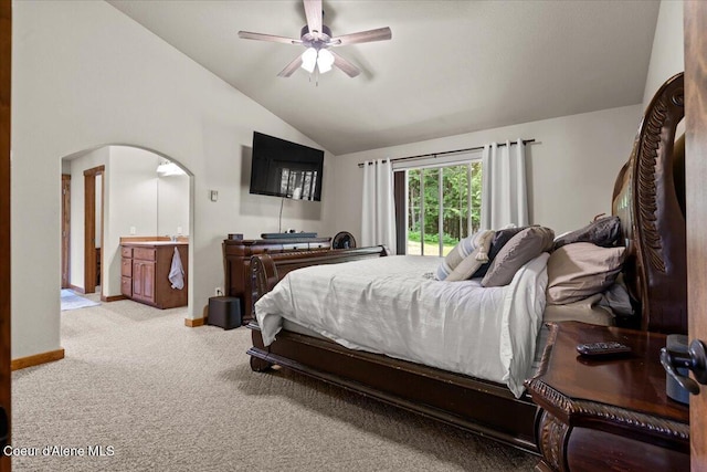 438 Berry Hl, Cocolalla, ID 83813 - carpeted bedroom with lofted ceiling, arched walkways, access to outside, and a ceiling fan