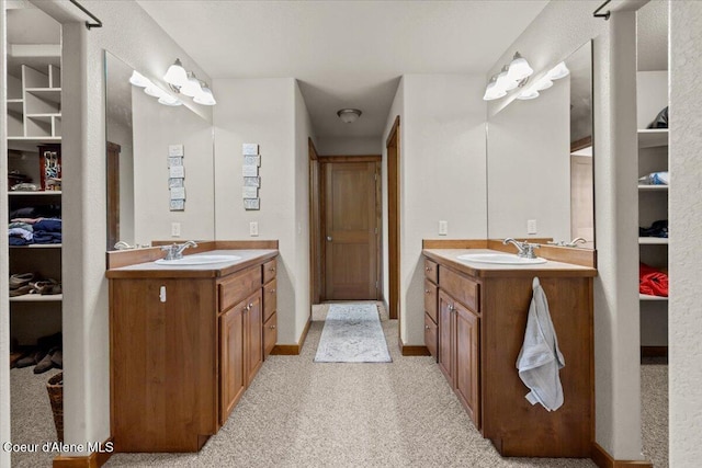 438 Berry Hl, Cocolalla, ID 83813 - full bathroom featuring two vanities and a spacious closet