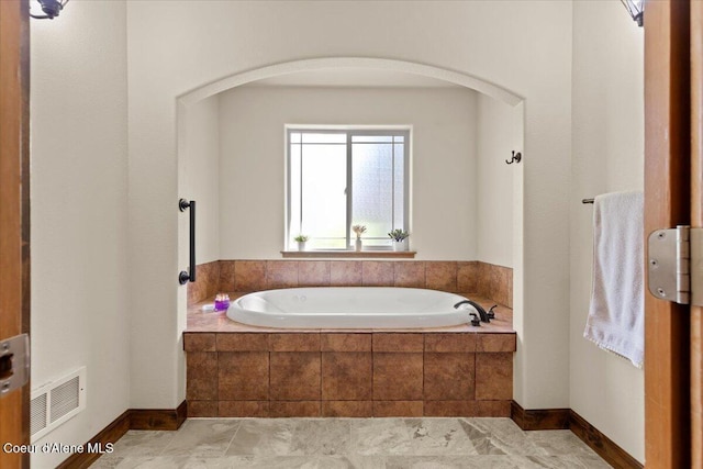 438 Berry Hl, Cocolalla, ID 83813 - bathroom featuring a bath and baseboards