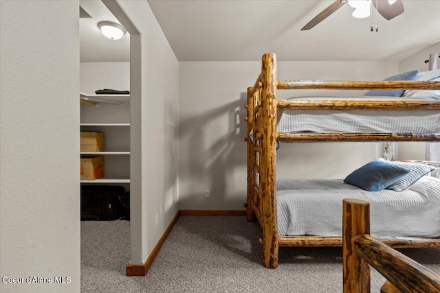438 Berry Hl, Cocolalla, ID 83813 - carpeted bedroom featuring baseboards and ceiling fan