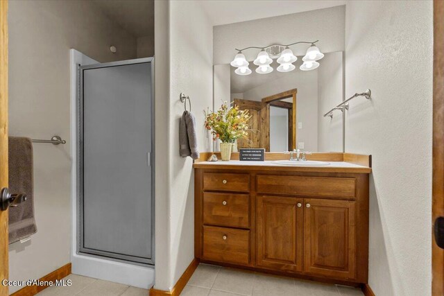 438 Berry Hl, Cocolalla, ID 83813 - bathroom with vanity, a stall shower, and tile patterned floors