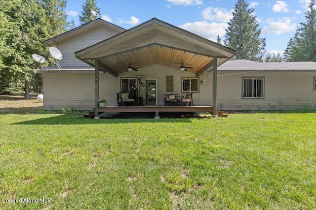 438 Berry Hl, Cocolalla, ID 83813 - back of property featuring ceiling fan and a lawn