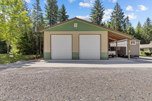 438 Berry Hl, Cocolalla, ID 83813 - garage with a detached garage and driveway