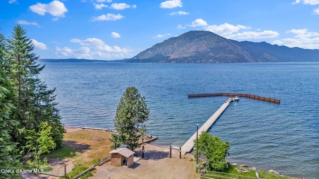 498 Lakeview Rd, Bayview, ID 83803 - water view with a mountain backdrop and a dock