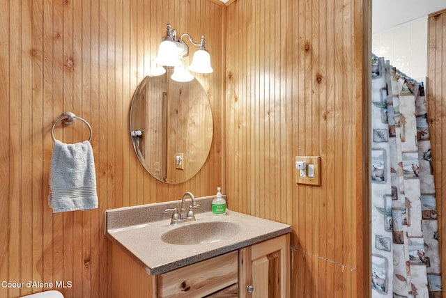 498 Lakeview Rd, Bayview, ID 83803 - bathroom with vanity and wooden walls