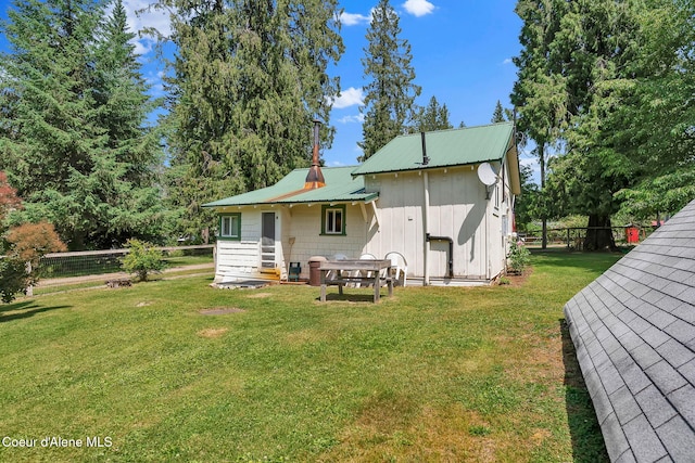 498 Lakeview Rd, Bayview, ID 83803 - rear view of property with a metal roof
