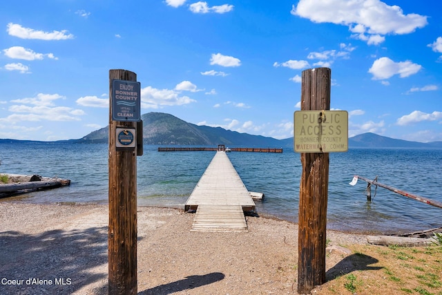 498 Lakeview Rd, Bayview, ID 83803 - water view with a mountainous background and a boat dock