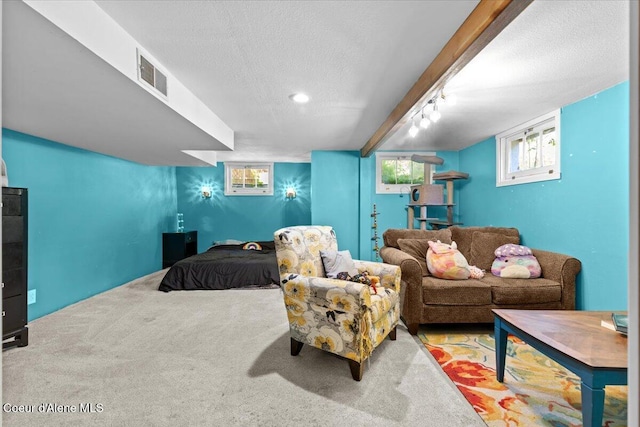2224 E Coeur D Alene Ave, Coeur Dalene, ID 83814 - living room featuring a textured ceiling and carpet