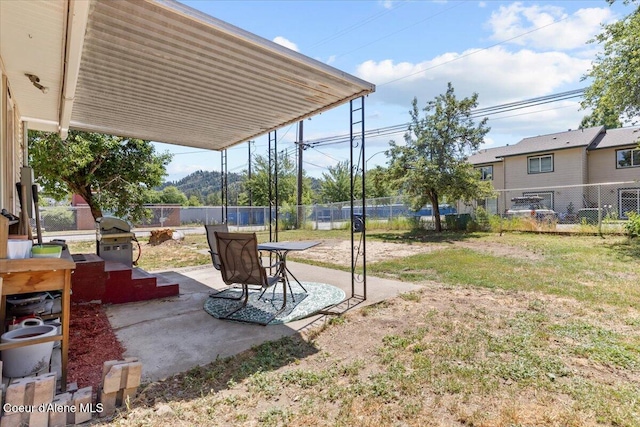 2224 E Coeur D Alene Ave, Coeur Dalene, ID 83814 - fenced backyard featuring a patio
