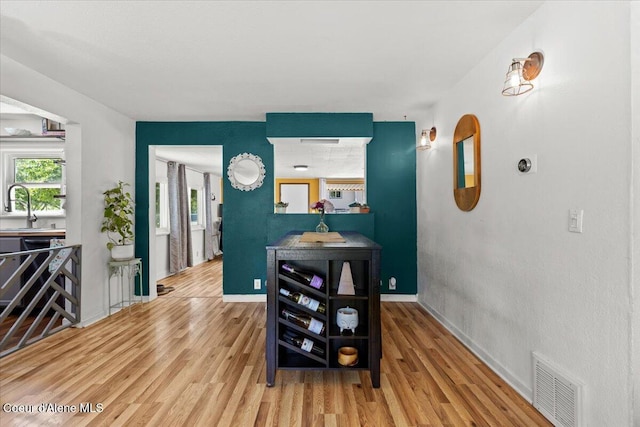 2224 E Coeur D Alene Ave, Coeur Dalene, ID 83814 - dining space with light wood-style floors and baseboards