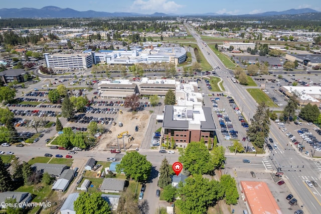 610 W Emma Ave, Coeur Dalene, ID 83814 - aerial overview of property's location featuring a mountainous background