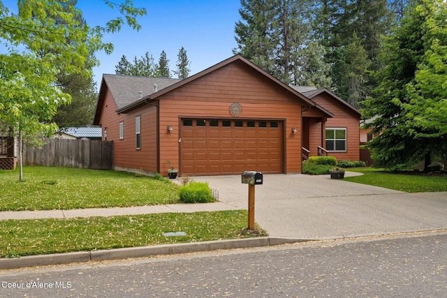 1625 Sequoia, Sandpoint, ID 83864 - rustic home featuring an attached garage and driveway