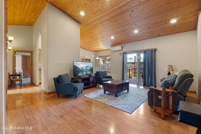 1625 Sequoia, Sandpoint, ID 83864 - living area with wooden ceiling, arched walkways, light wood-style floors, high vaulted ceiling, and recessed lighting