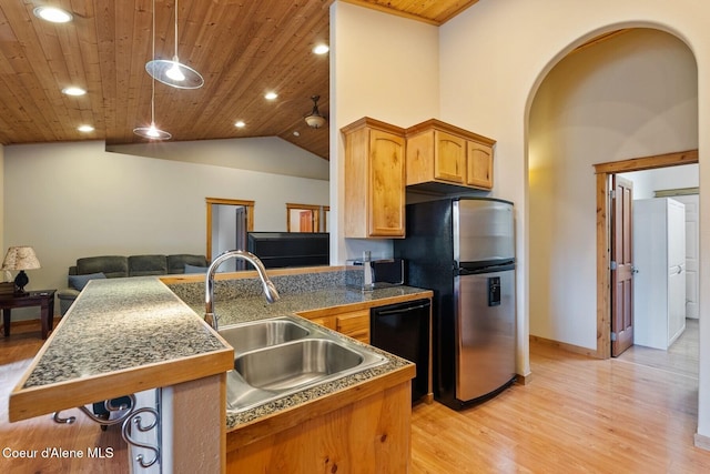 1625 Sequoia, Sandpoint, ID 83864 - kitchen with tile countertops, freestanding refrigerator, dishwasher, light wood finished floors, and open floor plan