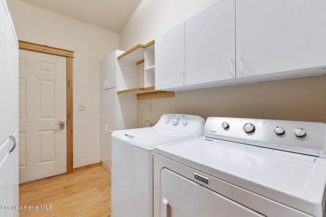 1625 Sequoia, Sandpoint, ID 83864 - laundry room with separate washer and dryer, light wood finished floors, and cabinet space