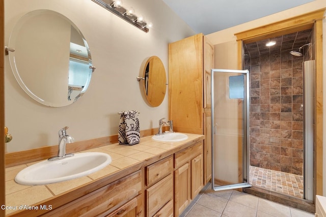 1625 Sequoia, Sandpoint, ID 83864 - full bathroom featuring a shower stall, double vanity, and tile patterned floors