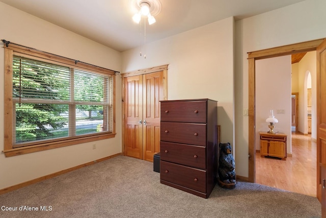 1625 Sequoia, Sandpoint, ID 83864 - bedroom featuring arched walkways and carpet floors