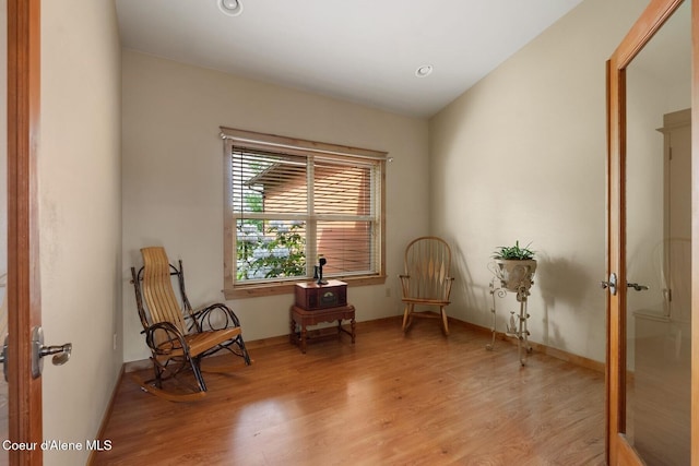 1625 Sequoia, Sandpoint, ID 83864 - sitting room with light wood-style floors and french doors