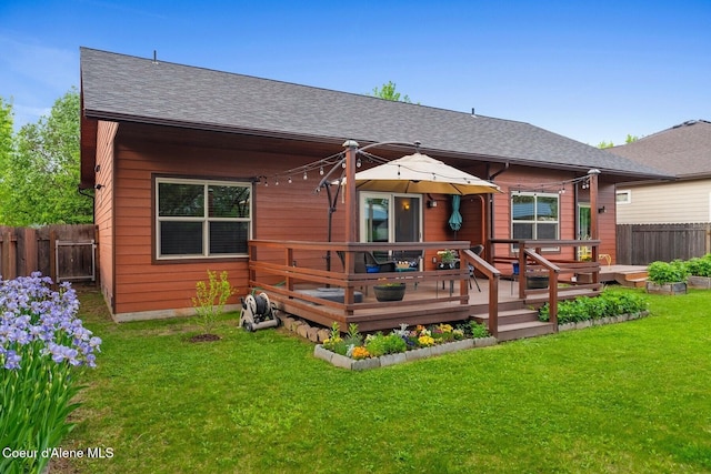 1625 Sequoia, Sandpoint, ID 83864 - rear view of property featuring a wooden deck and a shingled roof