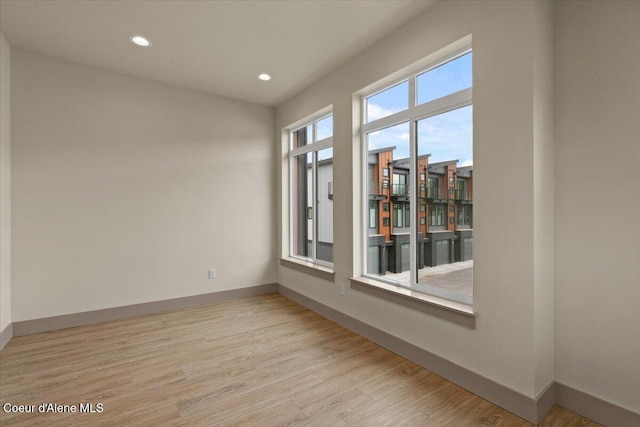 3026 Suzanne C, Coeur Dalene, ID 83815 - empty room featuring light wood-type flooring and recessed lighting