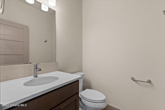 3026 Suzanne C, Coeur Dalene, ID 83815 - bathroom featuring vanity and backsplash