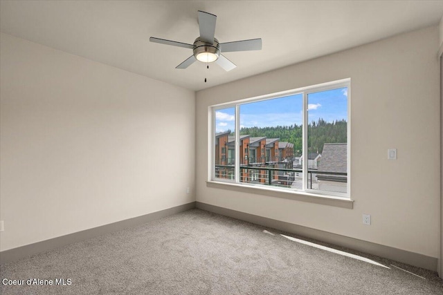 3026 Suzanne C, Coeur Dalene, ID 83815 - carpeted empty room with a ceiling fan and baseboards