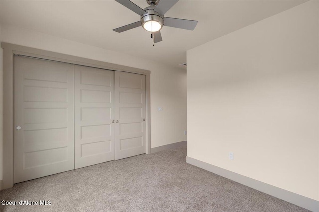3026 Suzanne C, Coeur Dalene, ID 83815 - unfurnished bedroom featuring carpet, a closet, and a ceiling fan