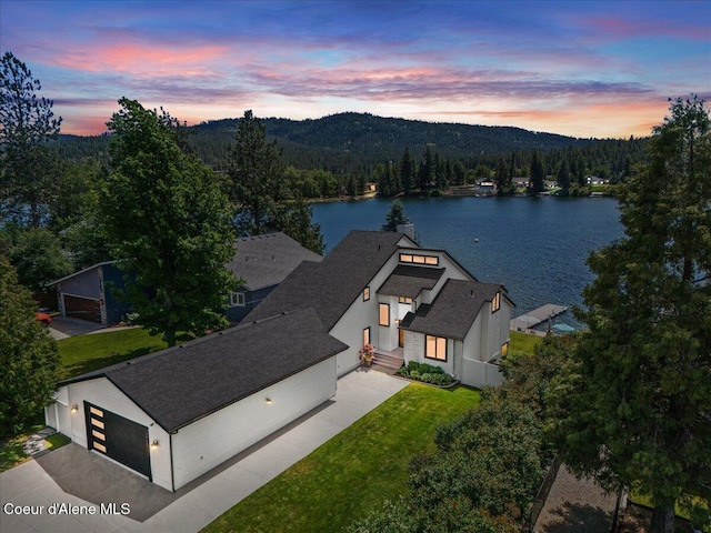 1922 E Rodkey Dr, Post Falls, ID 83854 - aerial view at dusk of a water view and a view of trees
