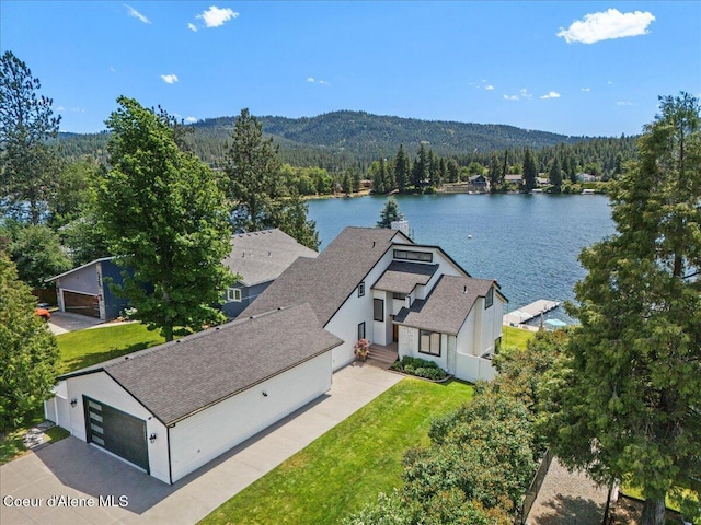 1922 E Rodkey Dr, Post Falls, ID 83854 - aerial view of property and surrounding area featuring a forest and a water and mountain view
