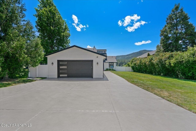 1922 E Rodkey Dr, Post Falls, ID 83854 - view of front of property with a garage
