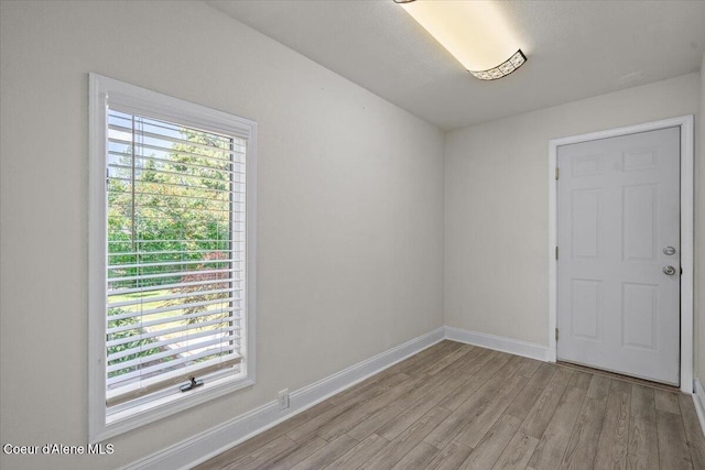 1922 E Rodkey Dr, Post Falls, ID 83854 - unfurnished room with light wood-type flooring and healthy amount of natural light