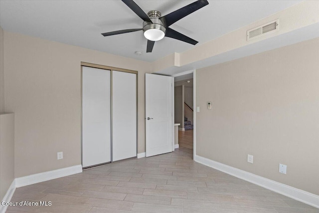 1922 E Rodkey Dr, Post Falls, ID 83854 - unfurnished bedroom featuring a closet, light wood-type flooring, and ceiling fan