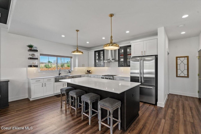 3811 N Foxtail Rd, Post Falls, ID 83854 - kitchen featuring high quality fridge, decorative backsplash, dark wood-style floors, light countertops, and recessed lighting