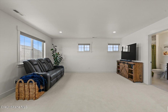 3811 N Foxtail Rd, Post Falls, ID 83854 - carpeted living area featuring recessed lighting