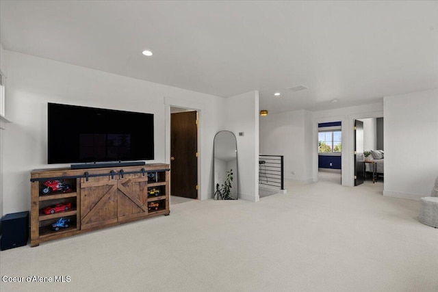 3811 N Foxtail Rd, Post Falls, ID 83854 - carpeted living area with recessed lighting and baseboards