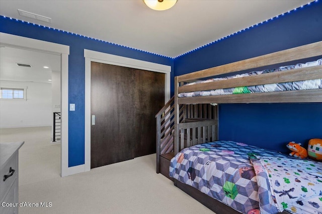 3811 N Foxtail Rd, Post Falls, ID 83854 - bedroom with carpet floors and a closet